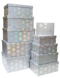 Набор из десяти прямоугольных подарочных коробок серебряного цвета, отделка матовой бумагой с тиснением "игрушки", размер 37*28*17 см.